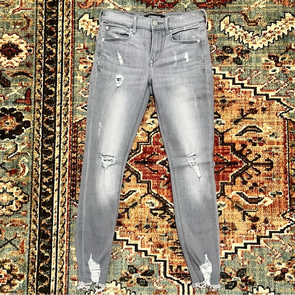 Express distressed mid rise grey skinny jeans